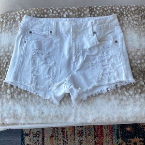 AE white distressed shorts